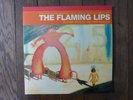 THE FLAMING LIPS- YOSHIMI BATTLES THE PINK ROBOTS- 2002 -RED VINYL - EXCELLENT