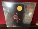 VIRGIN PRUNES- THE MOON LOOKED DOWN AND LAUGHED-ON TOUCH AND GO RECORDS- SEALED