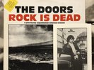 THE DOORS – ROCK IS DEAD LP + BOOKLET - RED LABEL 1982 GER TANGIE TOWN 62003