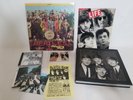 Sgt. Peppers Lonely Hearts Club Band - The Beatles with much more memorabilia.