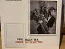 Paul  McCartney kisses on the bottom