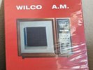 Wilco - A.M. (2015 Album, Club, Red/Tangerine Vinyl) (Nonesuch)