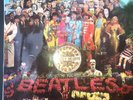 The Beatles - Sgt. Pepper’s Lonely Hearts Club Band (UK Vinyl LP, 1969).