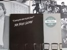 JEAN JACQUES GOLDMAN LP DEDICACE ENTRE GRIS CLAIR ET GRIS FONCE AUTOGRAPHE