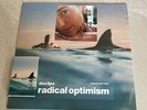 Dua Lipa: Radical Optimism Bundle Curacao Blue Vinyl Cassette Signed Art Card  ￼