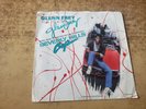 SIGNED 1980S MINT-EXC Glenn Frey  The Heat Is On / Shoot Out 52512 45
