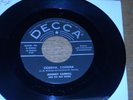 45RPM.  JOHNNY CARROLL.  WILD WILD WOMEN /  CORRINE CORRINA.  RE-ISS.