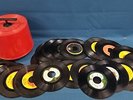 Red MCM Tote 45 Hartzell filled with The Beatles 45RPM 7