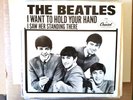 vinyl 45.  Beatles,  I Want To Hold Your Hand.   reissue.  PROMO w/ pic sleeve.