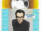 ELVIS COSTELLO Watching The Detectives Belgian imp. yellow/brown marbled 45 HEAR