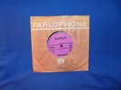 THE BEATLES SHE LOVES YOU – AUSTRALIAN 7” VINYL RECORD - PURPLE LABEL