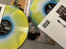 OASIS DEFINITELY MAYBE 30th ANNIVERSARY BLOOD RECORDS TRI COLOUR VINYL IN HAND