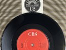 U2 -A Celebration- Irish 7” Red/White Labels, Translucent Vinyl/Double Dip Centr