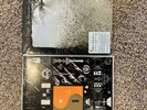 two Bon Iver vinyl lp's still in wrapping (For Emma, Forever Ago--22, a Million)