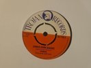 Pioneers, Simmer Down Quashie/Caranapo, Trojan TR 7746.