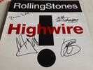 ORIGINAL HAND SIGNED ROLLING STONES BY JAGGER , WOOD , RICHARDS AND WATTS