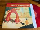 LP  2002 The Flaming Lips – Yoshimi Battles The Pink Robots - Red Translucent
