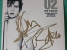 U2 New Year’s Day Irish 7” signed by Bono & Adam in 97 with original pics AFTAL
