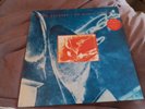 Dire Straits - On Every Street - 12