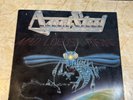 Agent Steel. Mad Locust Rising. EX Vinyl LP. 1986 OG. 12” EP. Blue Translucent.