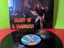 OZZY Osbourne Diary Of A Madman Lp VG+/VG+  1981 Vinyl Record black sabbath cd