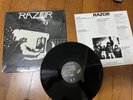 RAZOR -armed and dangerous FIRST PRESS CANADA  1984 LP  SHRINKWRAPPED