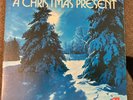 RONCO PRESENTS A CHRISTMAS  PRESENT LP RECORD w/ POP UP CHRISTMAS SCENE VINYL
