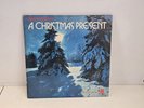 RONCO PRESENTS A CHRISTMAS  PRESENT LP RECORD w/ POP UP CHRISTMAS SCENE VINYL