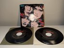 KISS: tears are falling / any way you slice it MERCURY & heavens on fire 45 RPM