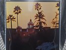 The Eagles Hotel California LP 1976 7E-1094-E FIRST CSM Press W/ POSTER VG+/VG+